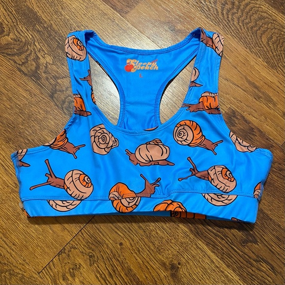 Sleepy Peach Blue Snail Print Sports Bra Sz L Workout Whimsical Playful Quirky - Picture 1 of 4